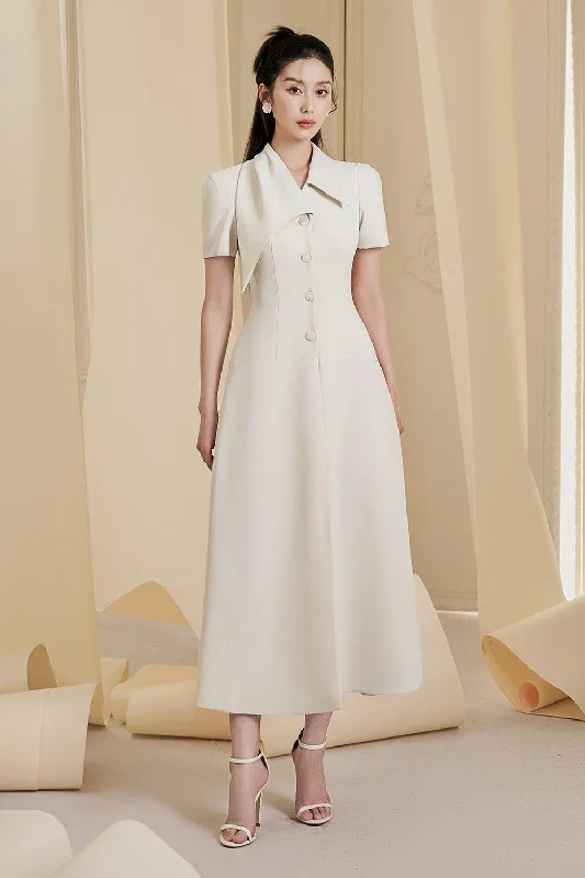 Midi dresses with puff sleeves for a vintage - inspired look Lettie A-line Short Sleeved Cotton Spandex Midi Dress