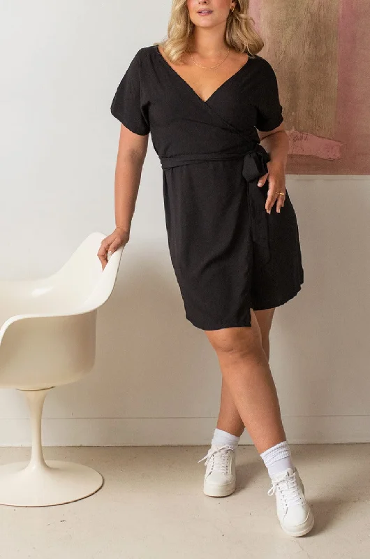 Mini dresses with tassel accents for a fun touch Rosie Black | Short Sleeve Black Dress