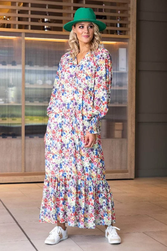 Midi dresses with pom - pom trims for a playful and festive look Kaiya Dress
