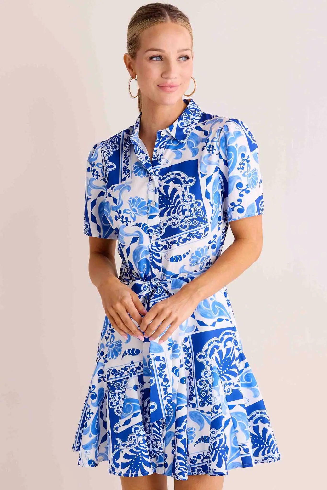 Mini dresses with asymmetric hems for a fashion - forward look Logan Dress