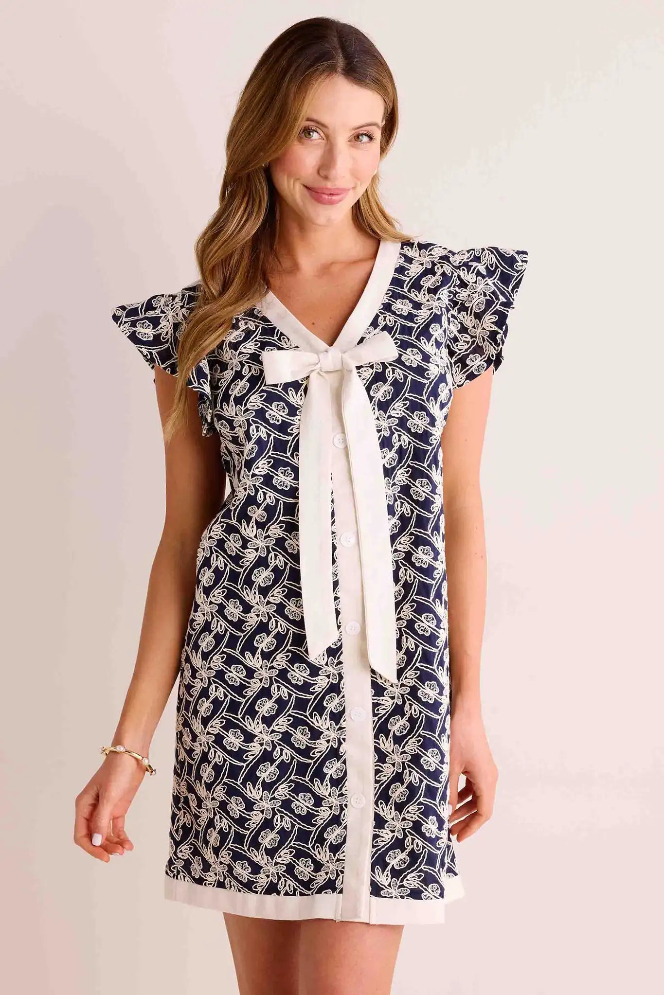 Mini dresses with criss - cross backs for a flirty look Shaye Dress