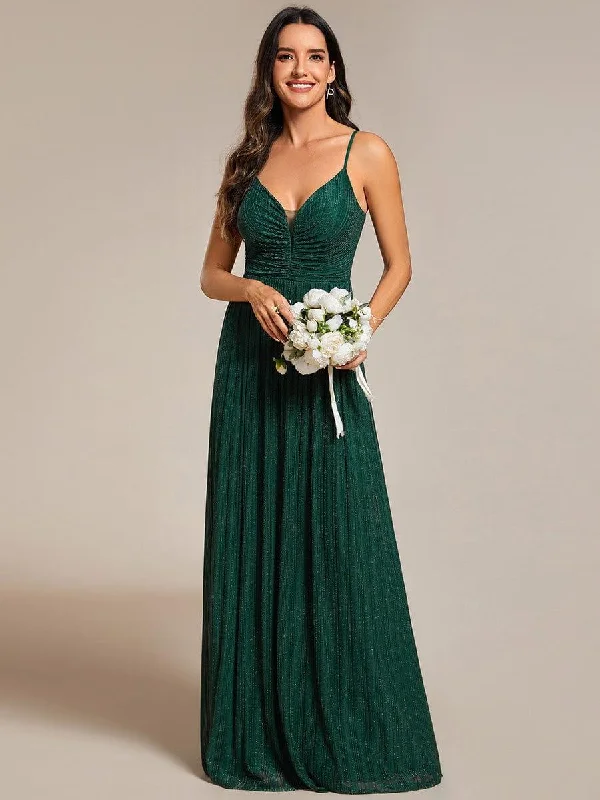 Wedding dresses with a bateau neckline for a classic shape​ Wedding guest dresses with tassel - adorned belts and A - line skirts High-Waisted Glittering Spaghetti Straps Formal Evening Dress with Pleated