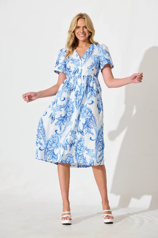 Everyday Dress with Solid - color Bodice and Printed Skirt for a Contrast Look​ Riello Midi Smock Dress in Blue and White Paisley Cotton