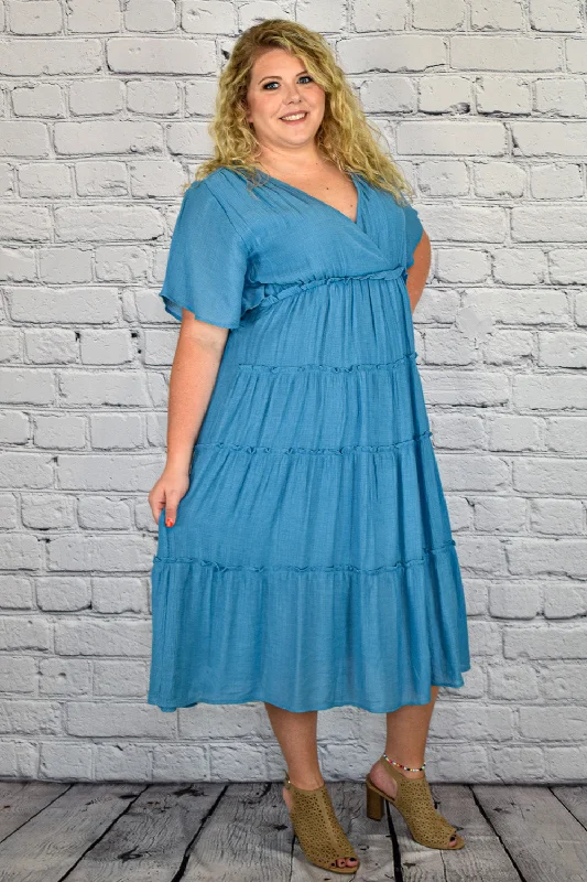 Stretchable Casual Dresses for a Flexible Fit​ Smocked V-Neck Tiered Maxi Dress in Plus Size by Umgee Clothing