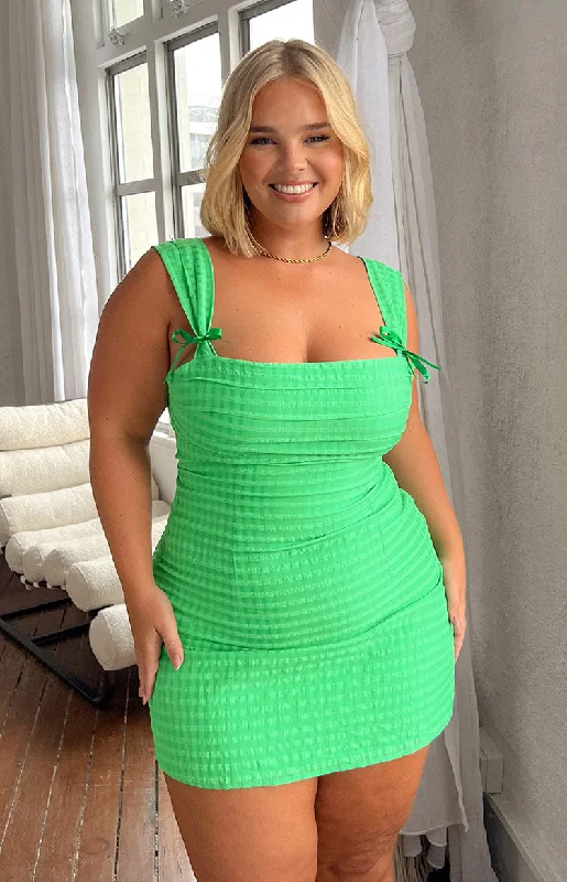 Mini dresses with pom - pom trims for a playful feel Layla Green Tie Back Mini Dress