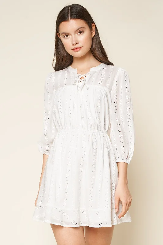 Mini dresses with pocket details for added functionality Is It Love Eyelet Mini Peasant Dress