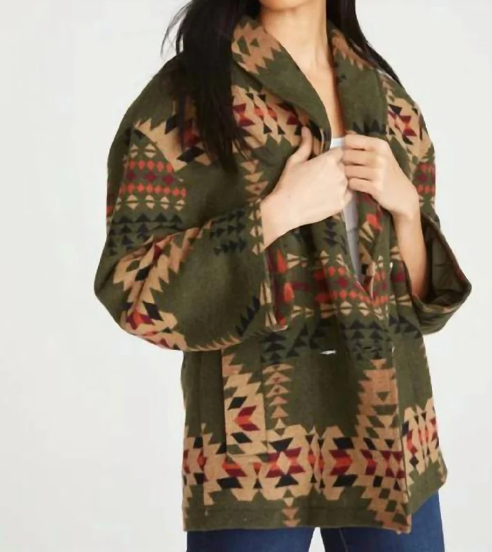 Women's faux fur coats in bright colors for a bold fashion statementAztec Jacket In Olive