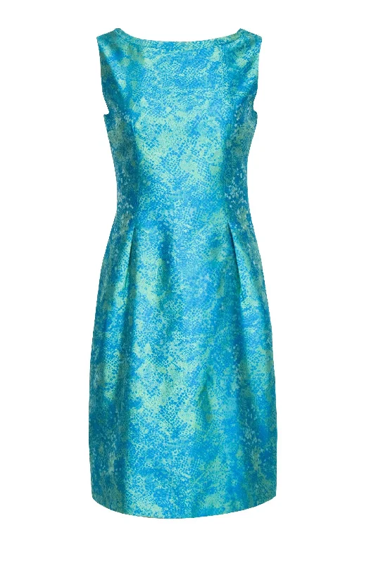 Plus Size Women Dress with a Flattering A - Line Cut for Comfort and Style Plus Size Women Dress with a Flattering A - Line Cut for Comfort and Style Elie Tahari - Iridescent Teal and Green Sleeveless Sheath Dress w/ Snake Print Sz 6
