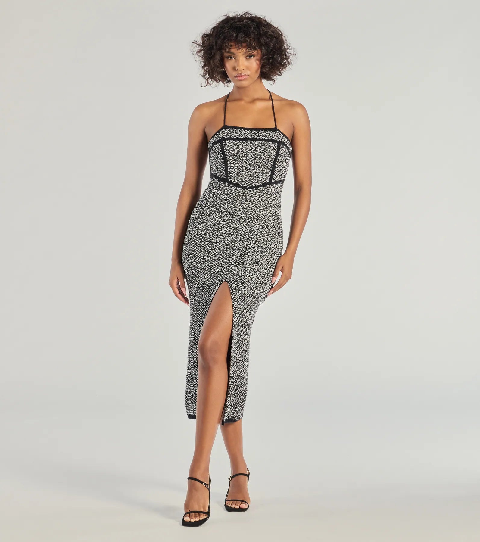 Midi dresses with ruffled sleeves for a more feminine and voluminous lookChic Beauty Strappy Back Knit Midi Dress