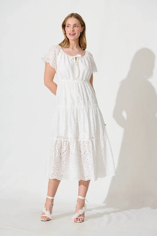 Midi dresses with polka dot prints for a playful summer outfitDovie Midi Dress In White Broderie Cotton