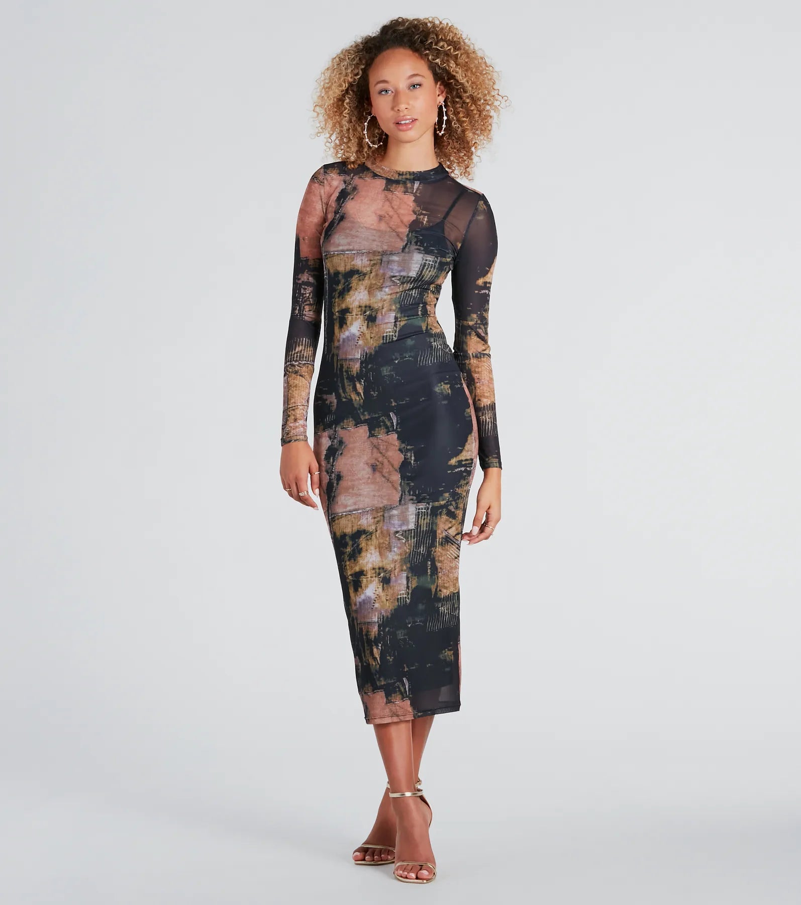 Midi dresses with ruffled sleeves for a more feminine and voluminous lookDowntown Chic Abstract Print Midi Dress