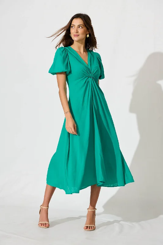 Midi dresses with gathered skirts for a full and flowing silhouetteHilde Midi Dress In Green Linen Blend