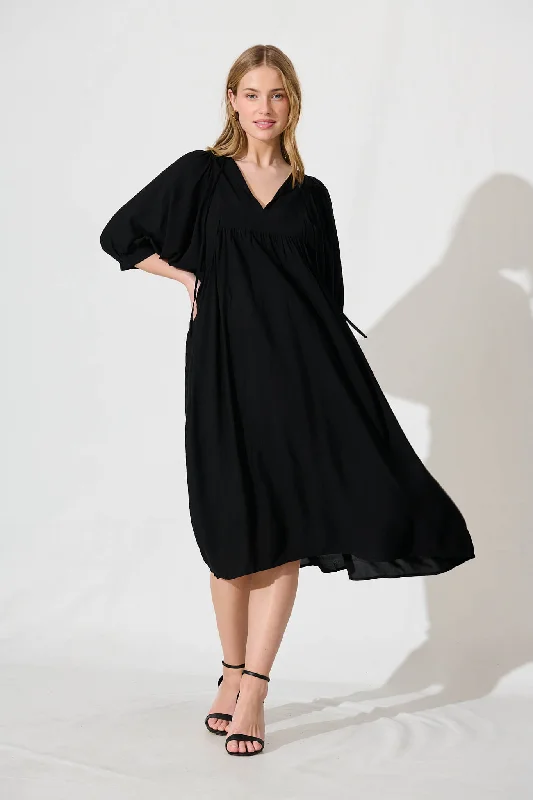 Midi dresses with button - down skirts for a unique and functional designSpring Afternoon Midi Smock Dress In Black