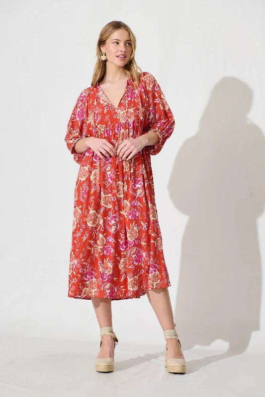 Midi dresses with keyhole backs for a flirty and unexpected detailSpring Afternoon Midi Smock Dress In Dark Tangerine With Multi Floral