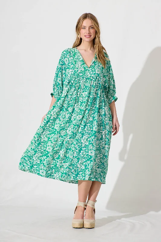 Midi dresses with V - necklines for a flattering and elongating effectSpring Afternoon Midi Smock Dress In Green With White Print