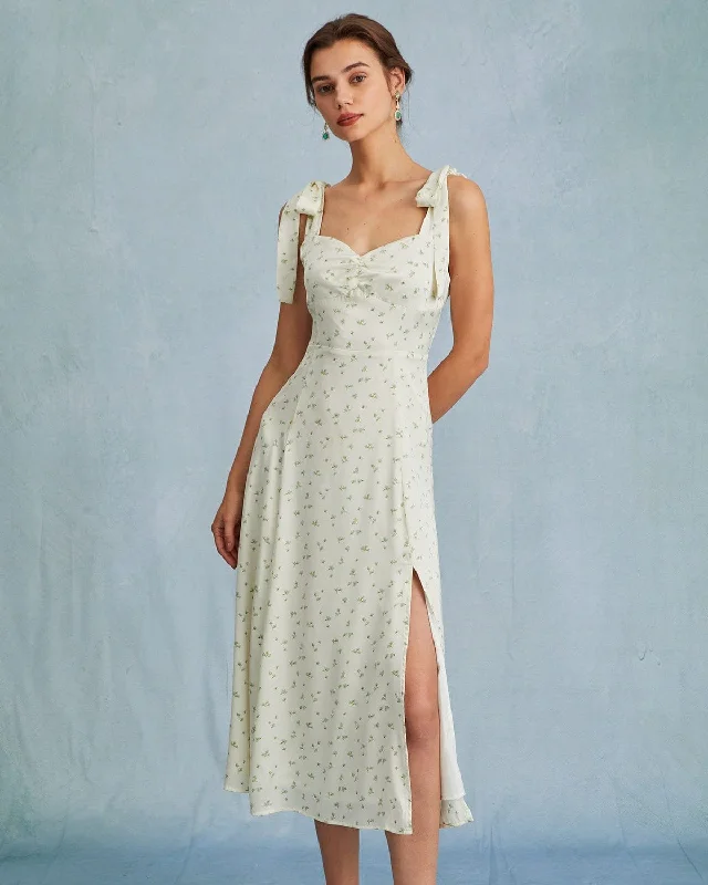 Sleeveless midi dresses with lace details for summer weddingsThe Light Green Satin Floral Tie Strap Slit Midi Dress