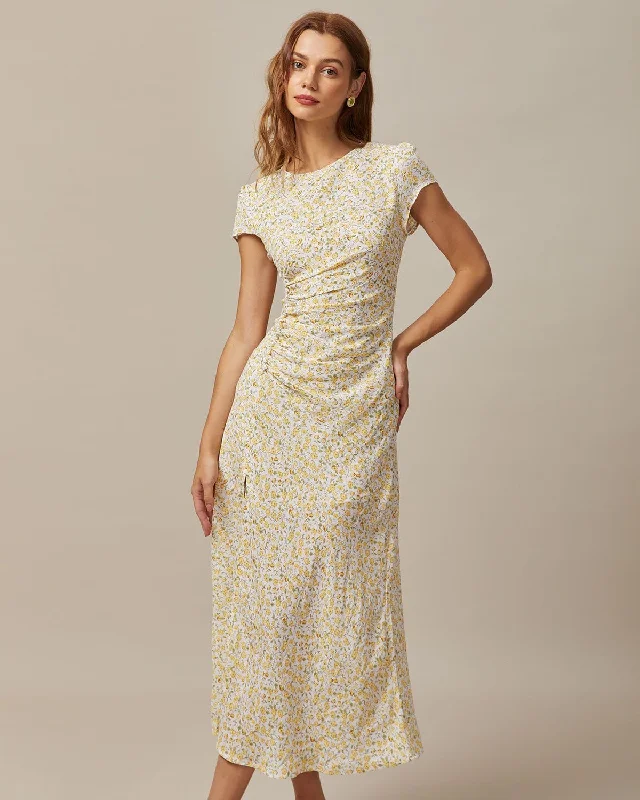 Midi dresses with keyhole backs for a flirty and unexpected detailThe Yellow Round Neck Floral Midi Dress
