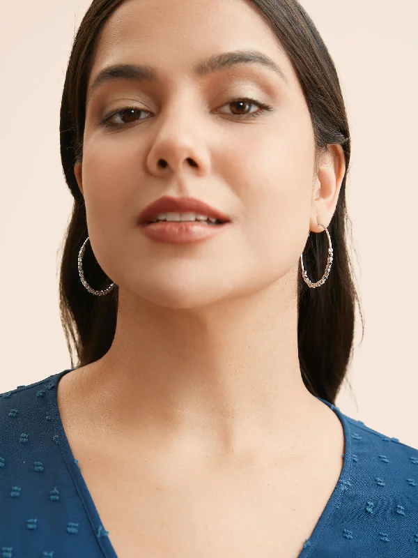 Party dresses with a handkerchief hem for a unique and flowing style​Bead Detail Hoop Earrings