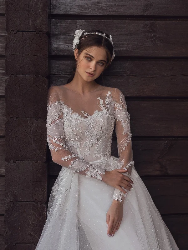 Wedding dresses with a sweetheart - neck and a corseted back​Long Sleeve Lace and Dot Tulle Wedding Gown