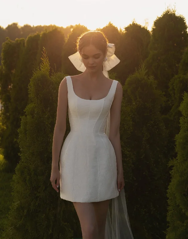 Plus - size wedding dresses with a flattering fit​Stunning Mini White Dress
