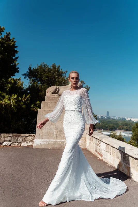 Wedding dresses with a corseted bodice for a cinched waist​Tina Holly BB016 Long Sleeve Mermaid Wedding Dress
