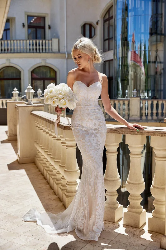 Wedding dresses with a dropped waist for a retro style​Tina Holly T17101W Fitted Mermaid Sequin Long Boho Wedding Dress
