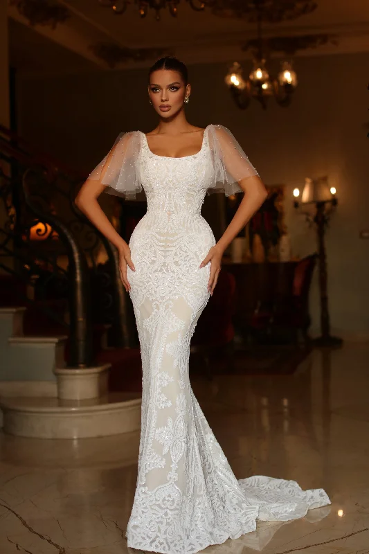 Wedding dresses with a mermaid - style skirt and a ball gown overlay​Tina Holly TW111 Long Mermaid Sequin Detachable Sleeve Wedding Dress