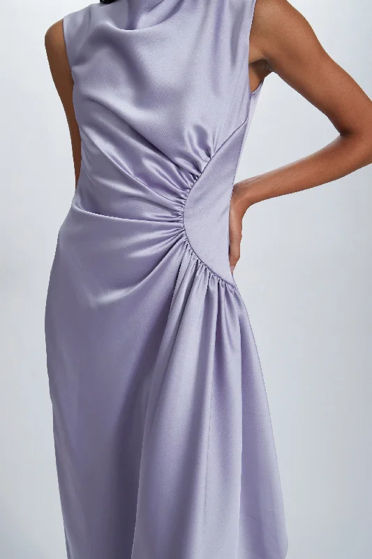 Strapless formal dresses with tulle skirts for a classic prom lookAsymmetric Draped Gown
